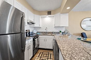 Black and stainless steel appliances