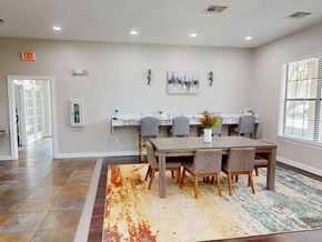 Denham Springs apartment for rent - A dining room with a table set for four.
