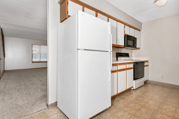Derby apartment for rent - a kitchen with white appliances and a white refrigerator