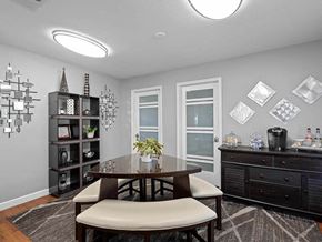 Topeka townhouse for rent - a dining room with a table and chairs