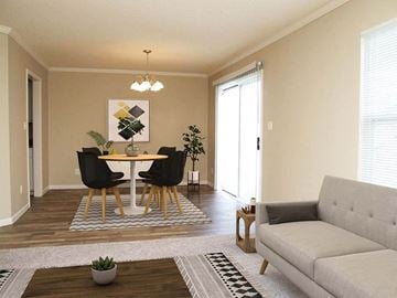 Topeka townhouse for rent - a living room with a table and a couch