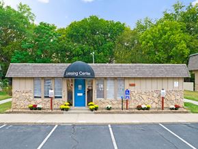 Topeka townhouse for rent - the leasing center is located on the corner of a parking lot