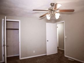 Terre Haute apartment for rent - bedroom area with closet and overhead light and fan