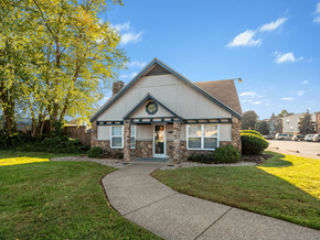 Clarksville apartment for rent - the front of a house with a sidewalk and grass