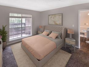 Jackson apartment for rent - a bedroom with a bed and a window