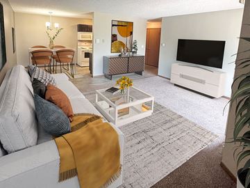 Waite Park apartment for rent - A living room with a grey couch and a coffee table.
