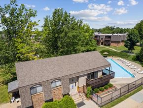Cedar Rapids apartment for rent - an aerial view of a clubhouse with a pool