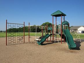 Valley Center triplex for rent - a playground with slides at a park