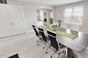 Grand Rapids townhouse for rent - A conference room with a long table and chairs.