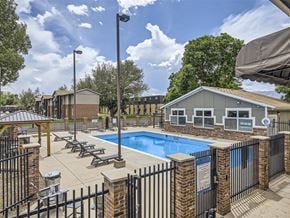 Fort Collins apartment for rent - our apartments have a resort style pool with lounge chairs