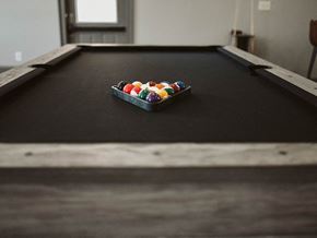San Angelo apartment for rent - a pool table with a bowl of balls on it