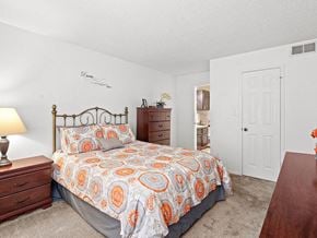 Topeka apartment for rent - a bedroom with a bed and a closet