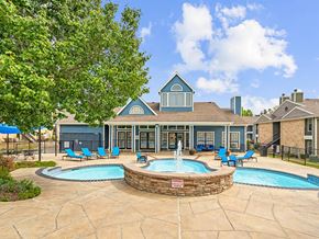 Topeka apartment for rent - our apartments have a large pool and patio with chairs