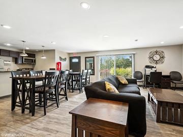 West Chester apartment for rent - a living room and kitchen with a table and chairs