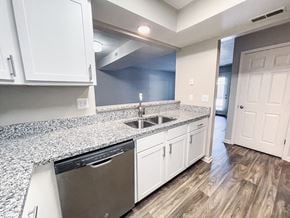 Grand Rapids apartment for rent - Kitchen with window overlooking the living room 