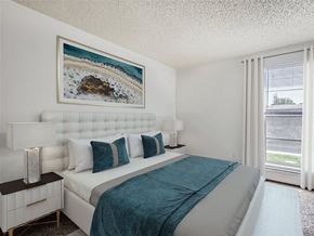Greeley apartment for rent - a bedroom with a bed and a window