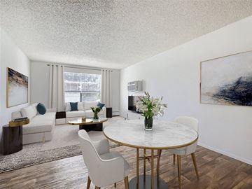 Greeley apartment for rent - a living room with a couch and a table