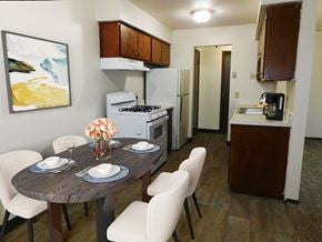 Brooklyn Park apartment for rent - connected living and dining area at west broadway apartments