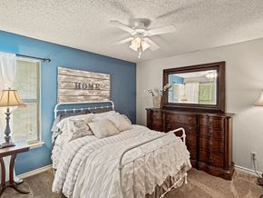 Kansas City apartment for rent - apartment bedroom with a ceiling fan
