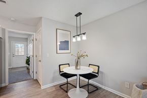 Greenville apartment for rent - A dining room with a white table and chairs.