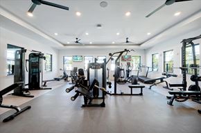 Fruitland Park apartment for rent - A spacious gym with a variety of equipment.