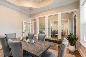 Greensboro apartment for rent - a dining room with a table and chairs