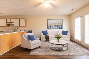 Fayetteville apartment for rent - a living room with a couch and a table