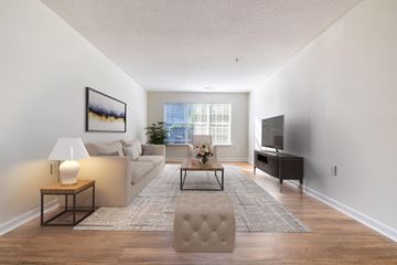 Clayton apartment for rent - a living room with a couch and a coffee table