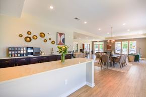 Burlington apartment for rent - a large kitchen and dining room with a table and chairs