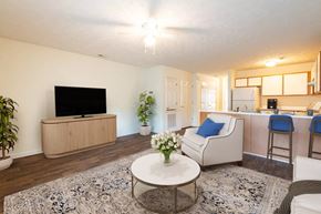 Fayetteville apartment for rent - a living room with a couch and a table