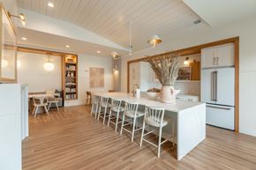 Summerville apartment for rent - a large kitchen with a white counter top and a dining table
