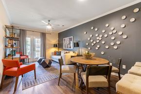 Greensboro apartment for rent - A modern dining room with a round table and chairs.