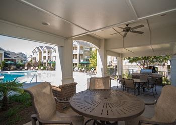 Outdoor lounge by the sparkling swimming pool at hawthorne at the greene