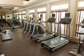 Huntsville apartment for rent - A gym with treadmills and elliptical machines.