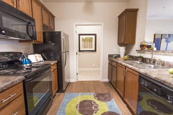 Sleek, black, energy efficient appliances at hawthorne at murrayville
