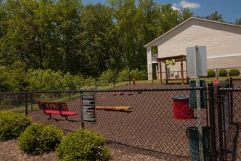 Bark park with agility equipment at hawthorne at the hall
