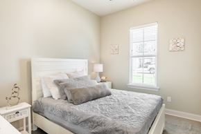 Lake Charles apartment for rent - a bedroom with a bed and a window