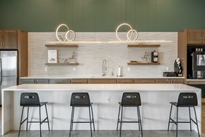 Lake Charles apartment for rent - a kitchen with a counter and three stools
