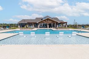 Lake Charles apartment for rent - the pool at the preserve at ballantyne commons with a house in the background