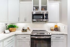Greensboro apartment for rent - Modern Kitchens with Stand-Alone Islands, Designer Tile Backsplash, Granite Countertops, Stainless Steel Appliances, and Smooth Ceramic Cooktops*
