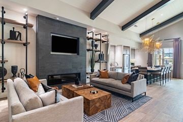 Greensboro apartment for rent - a living room with couches and a coffee table