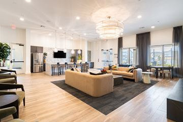 San Antonio apartment for rent - A spacious living room with a large sofa set and a television.