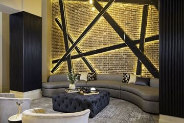 Houston apartment for rent - a living room with a couch and a large window