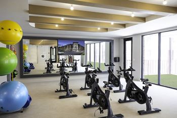 Spin center/yoga studio with outdoor stretching patio