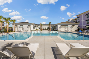 Little River apartment for rent - our apartments have a large pool and lounge chairs
