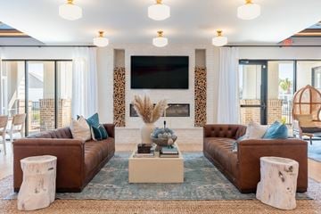 Leland apartment for rent - a living room with two couches and a television