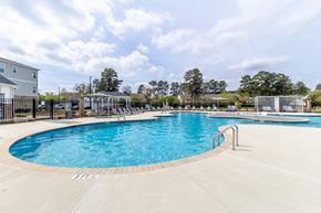 Greenville apartment for rent - our apartments have a resort style pool with chairs