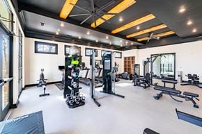 Charlotte townhouse for rent - A spacious gym with a variety of equipment.