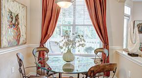 Rock Hill apartment for rent - A dining room with a glass table and chairs.