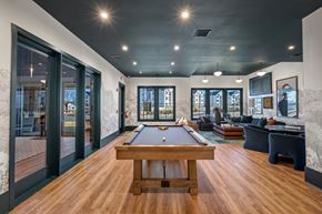 Wellford apartment for rent - A room with a pool table and a couch.